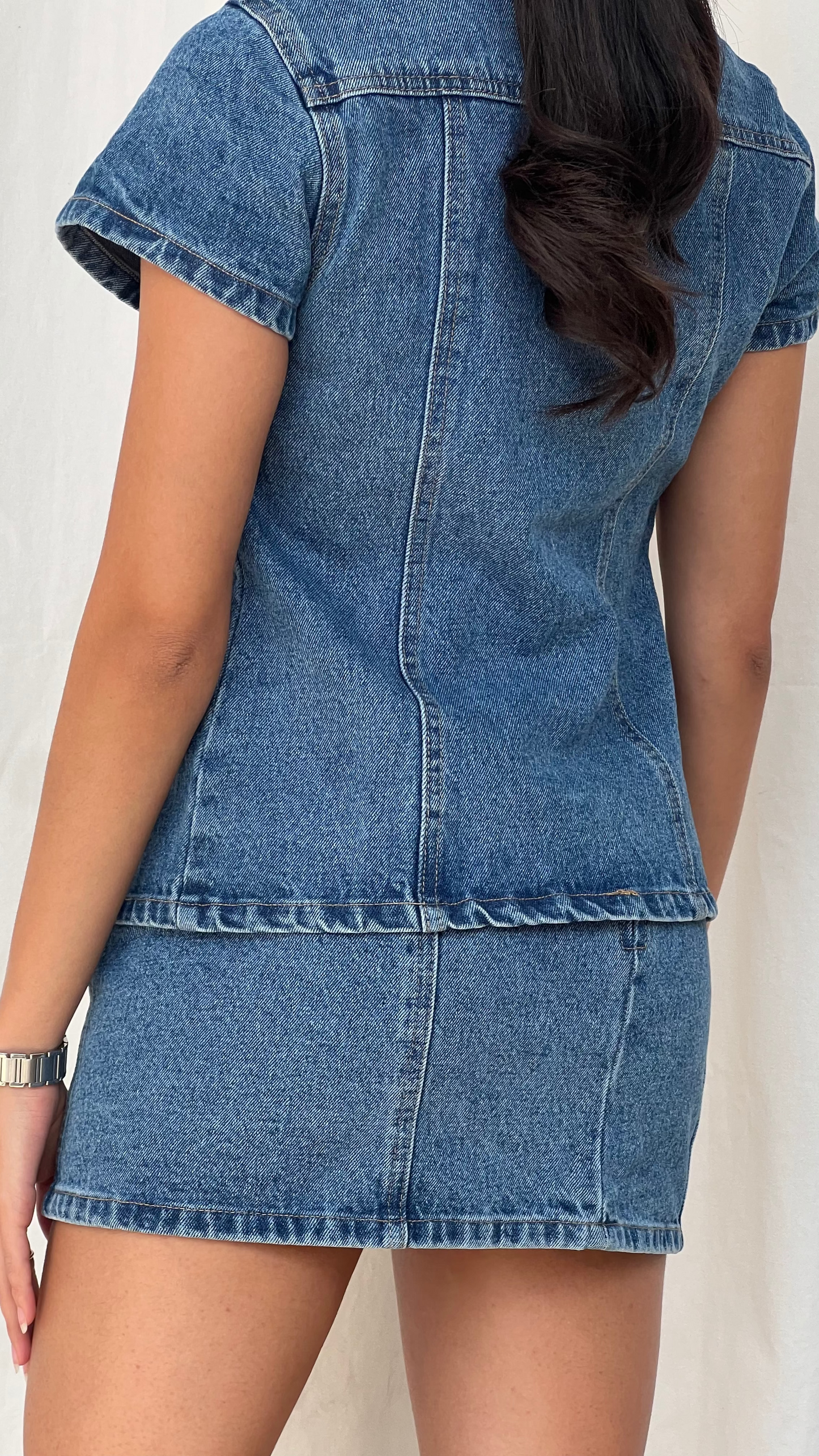 Set denim de chaleco y mini falda