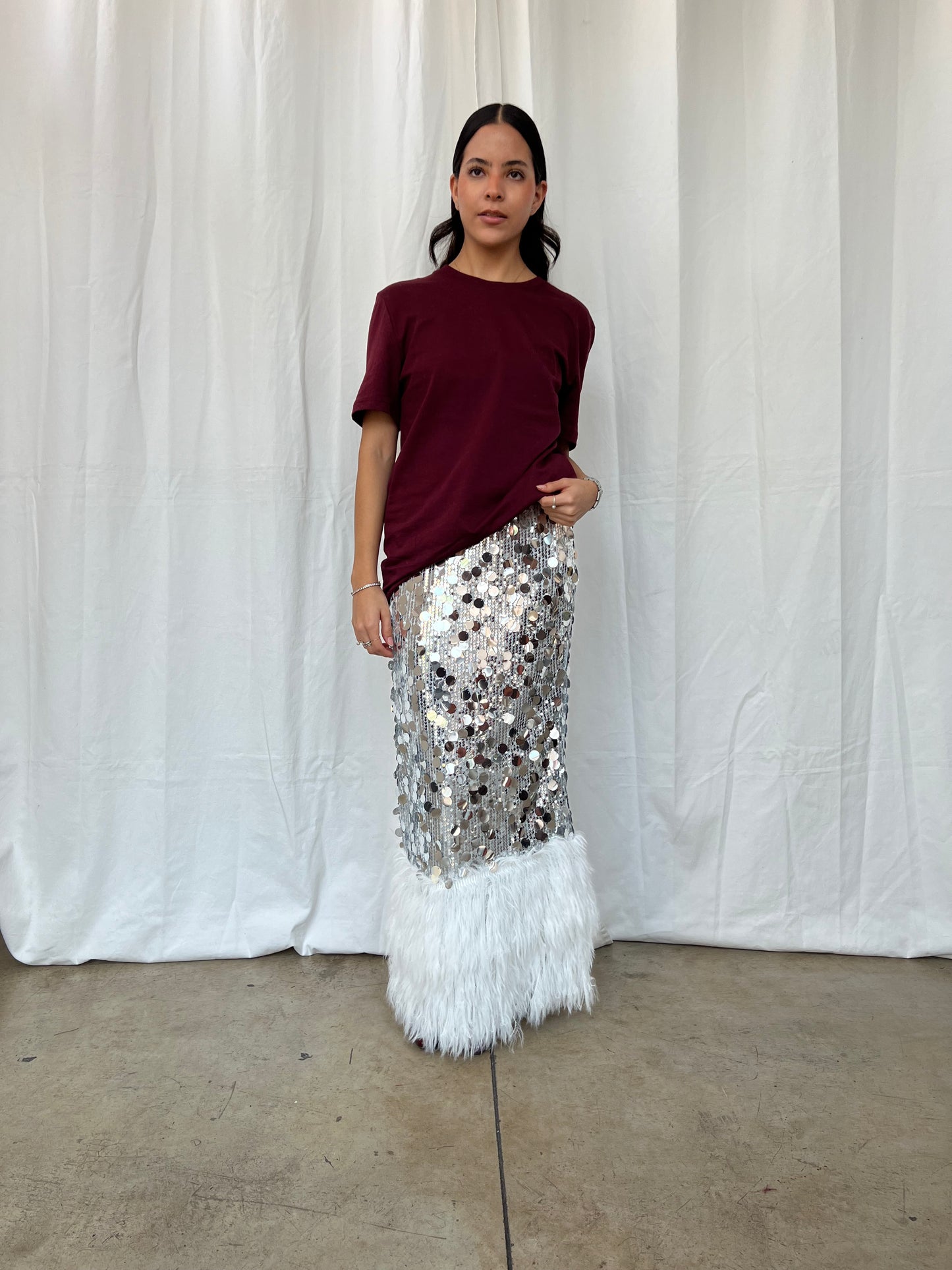 Falda maxi lentejuela con plumas