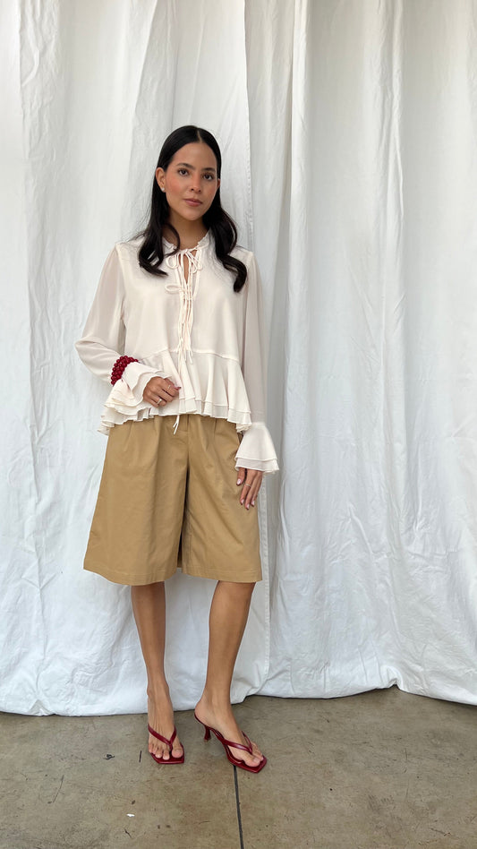 Top Peplum manga larga