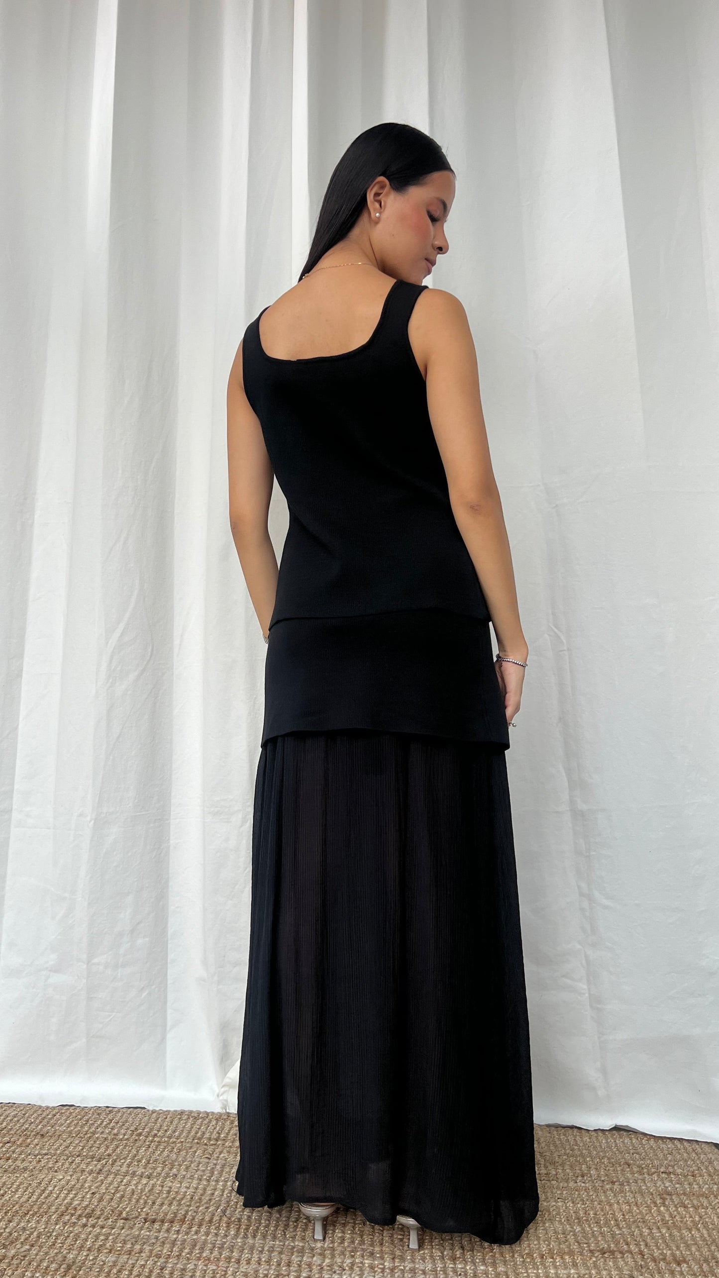 Set de chaleco y falda negra