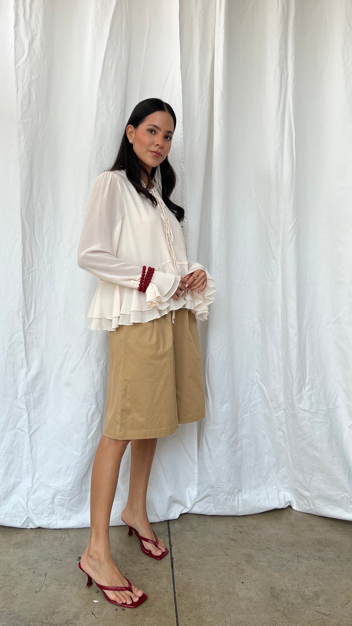 Top Peplum manga larga
