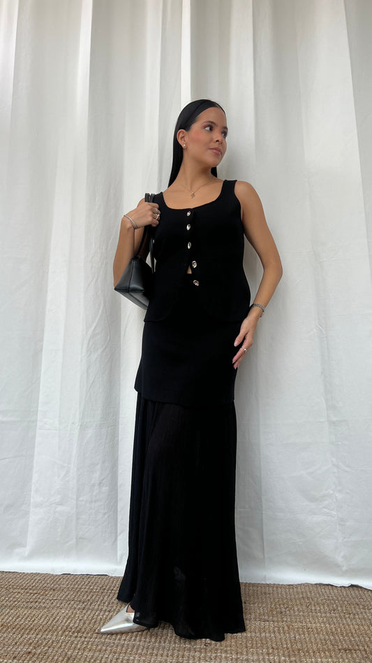 Set de chaleco y falda negra