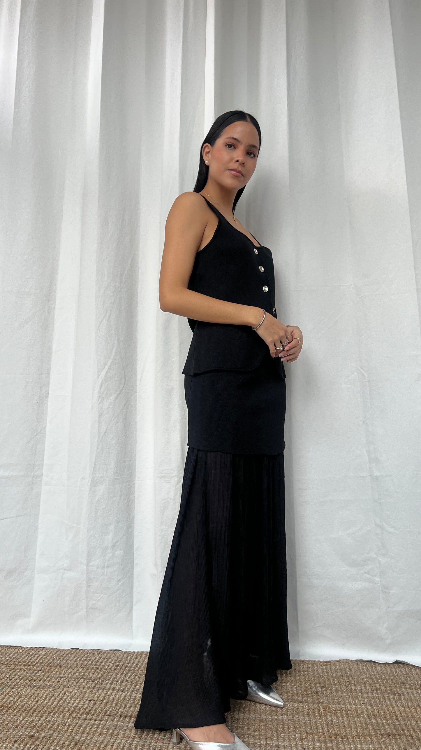 Set de chaleco y falda negra