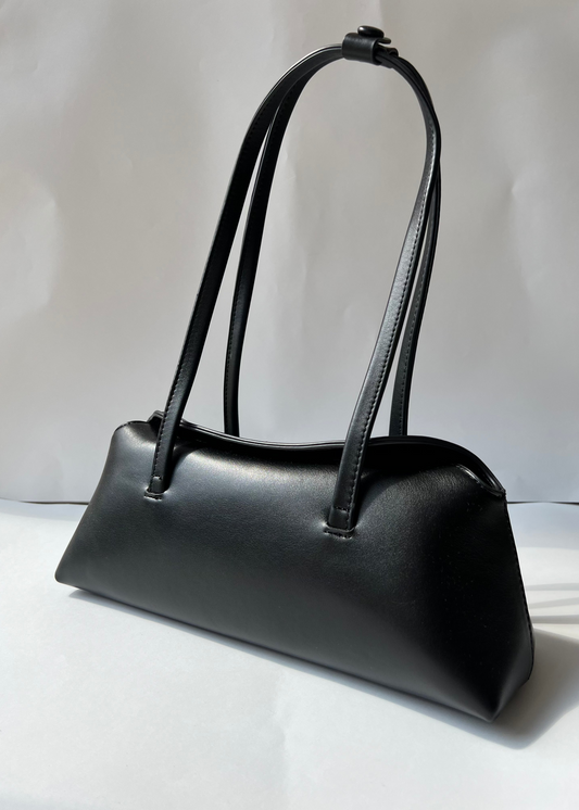 Bolsa Valeria baguette con tapa curva color negra
