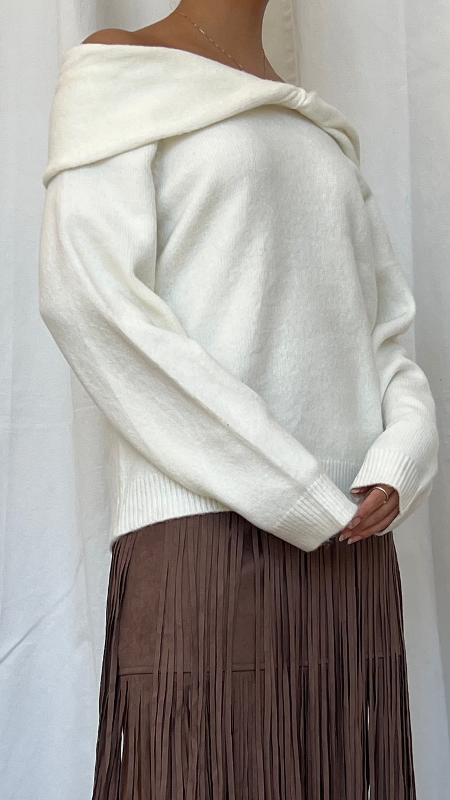 Suéter off shoulder blanco