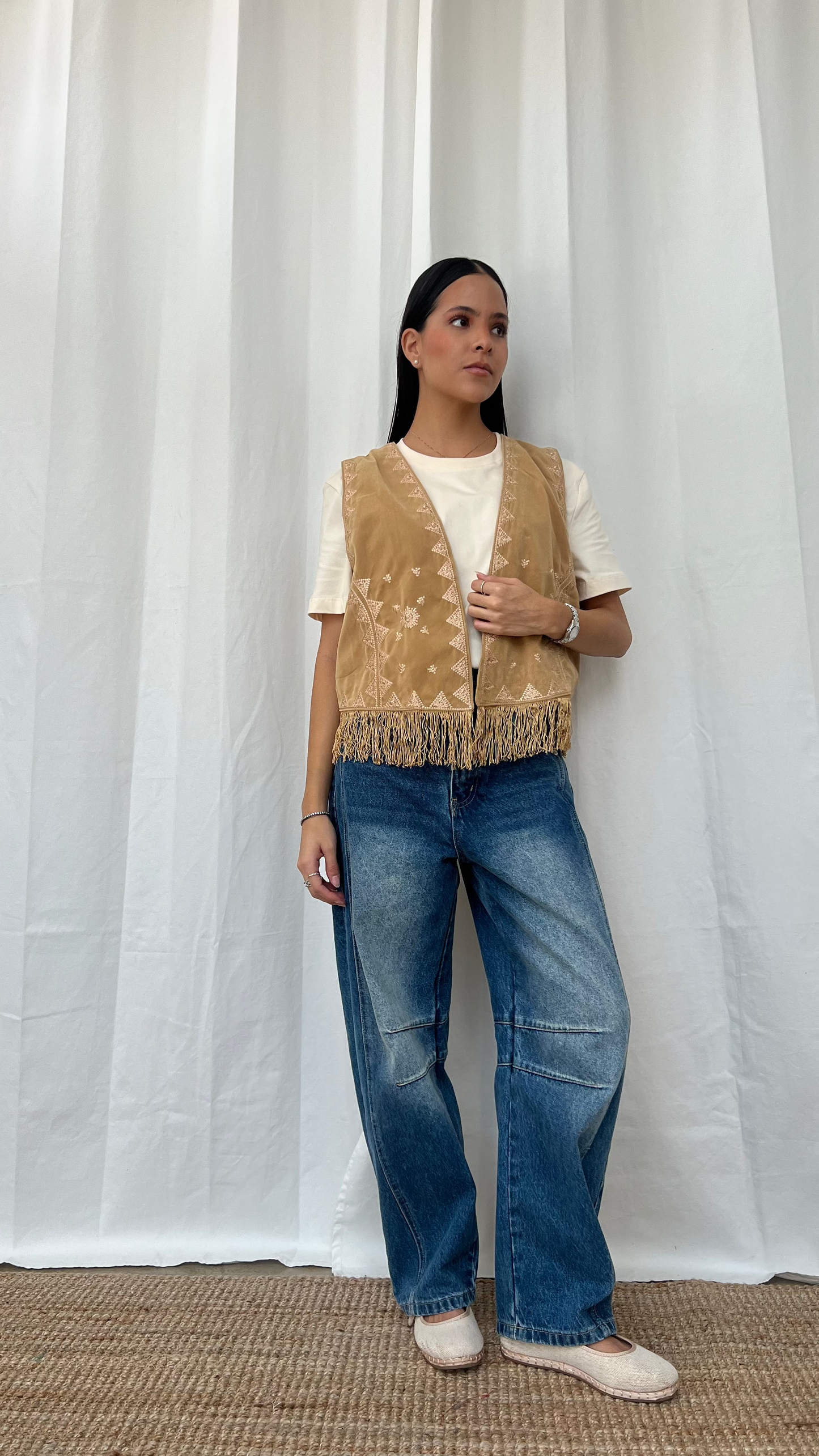 Chaleco mostaza con flecos